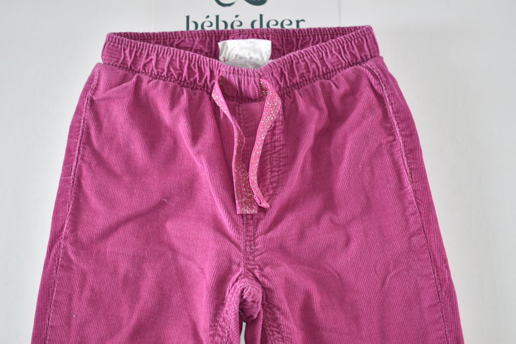 Bright pink lined corduroy trousers