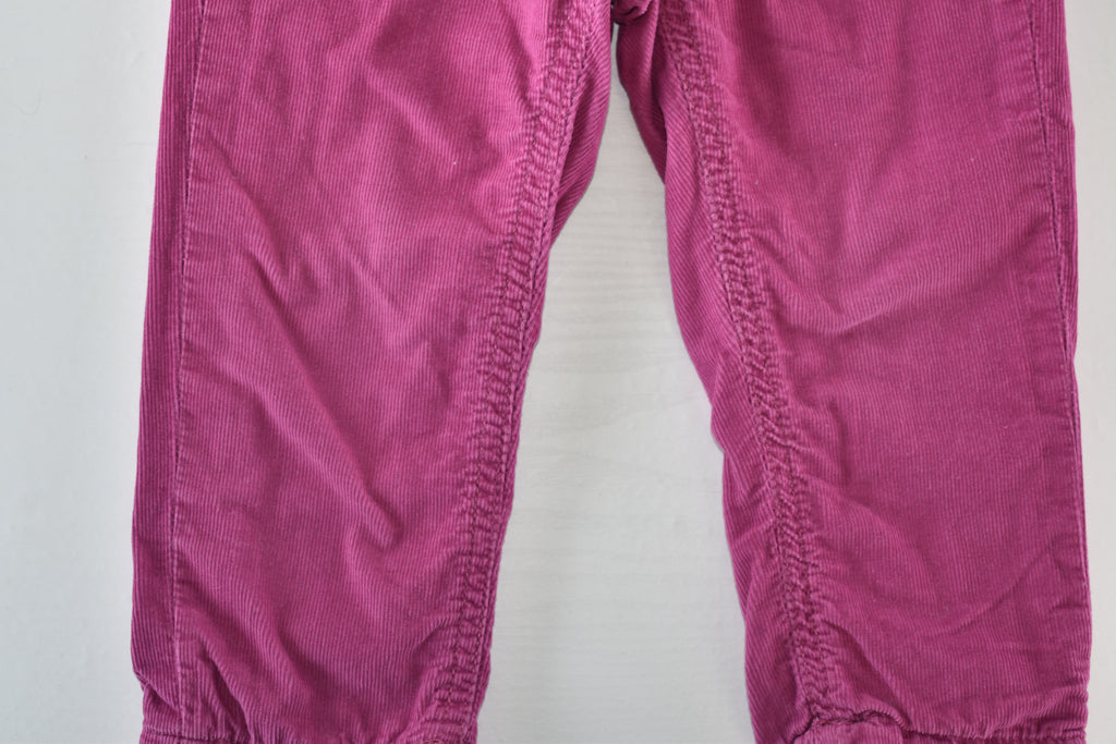 Bright pink lined corduroy trousers