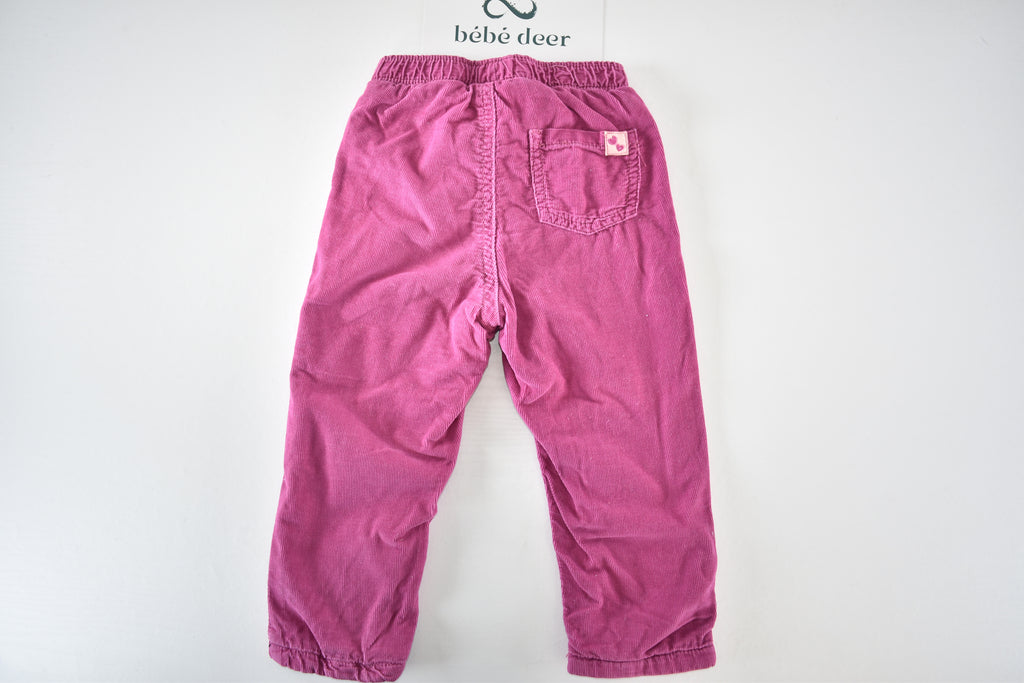 Bright pink lined corduroy trousers