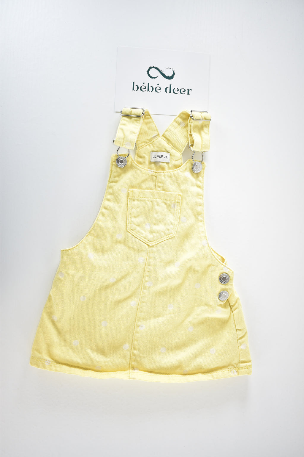 Yellow spotted pinafore dress