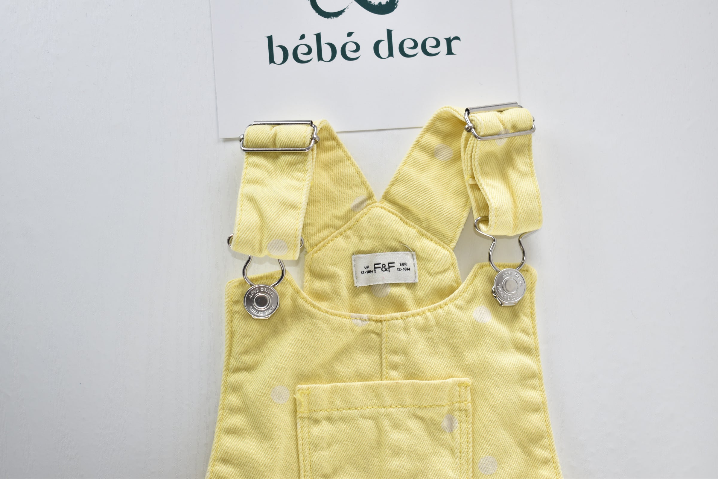 Yellow spotted pinafore dress