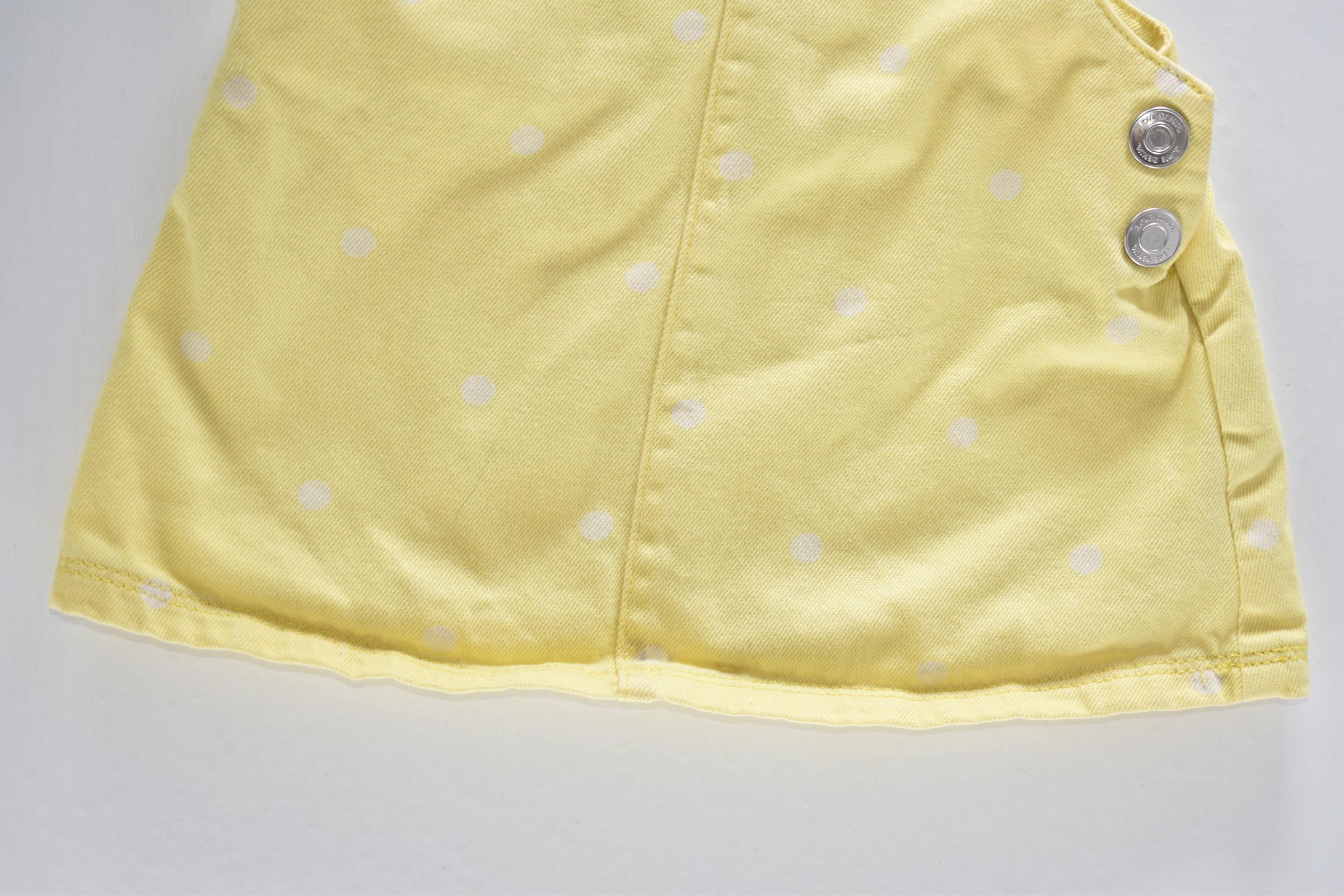 Yellow spotted pinafore dress
