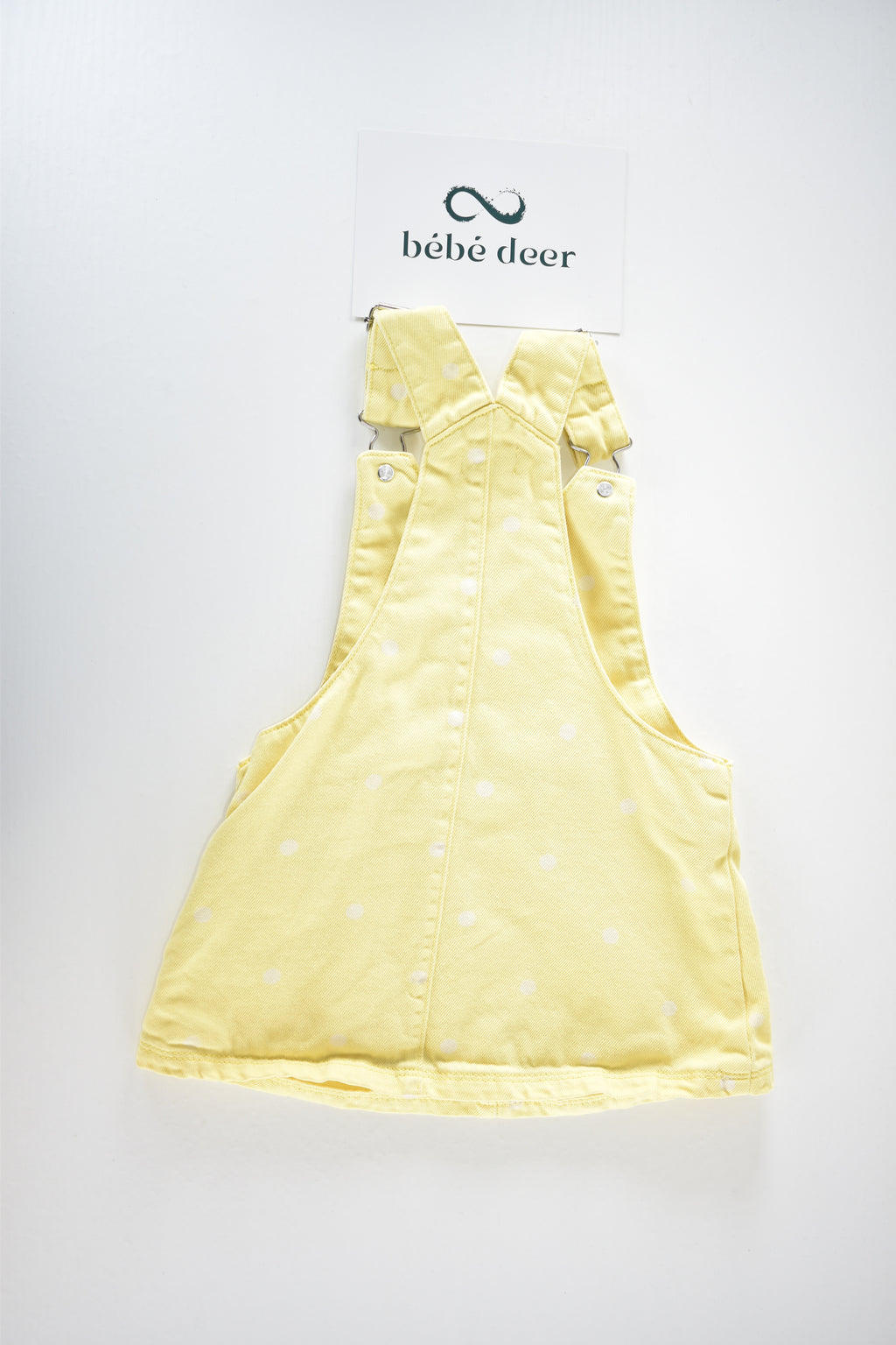 Yellow spotted pinafore dress
