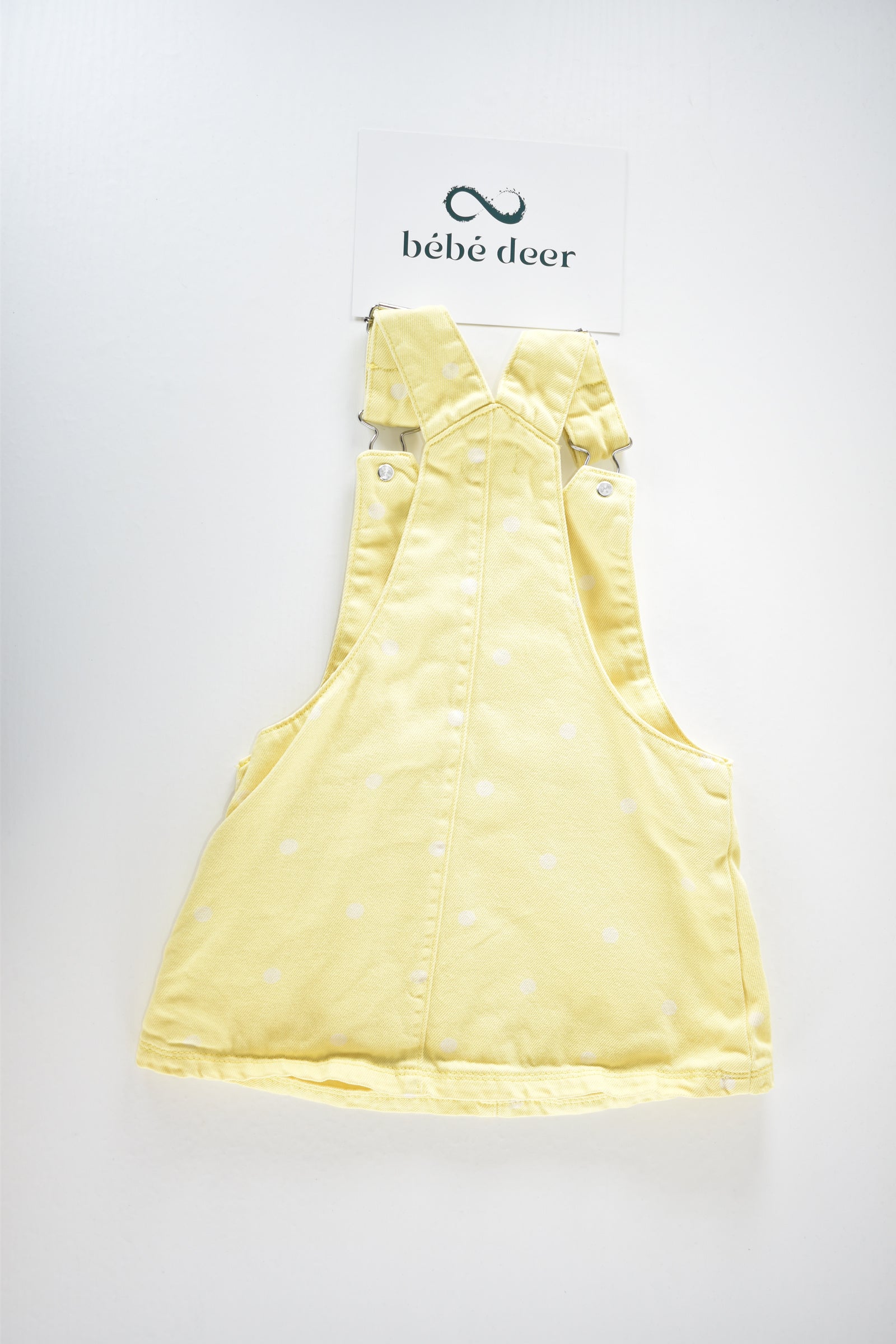 Yellow spotted pinafore dress