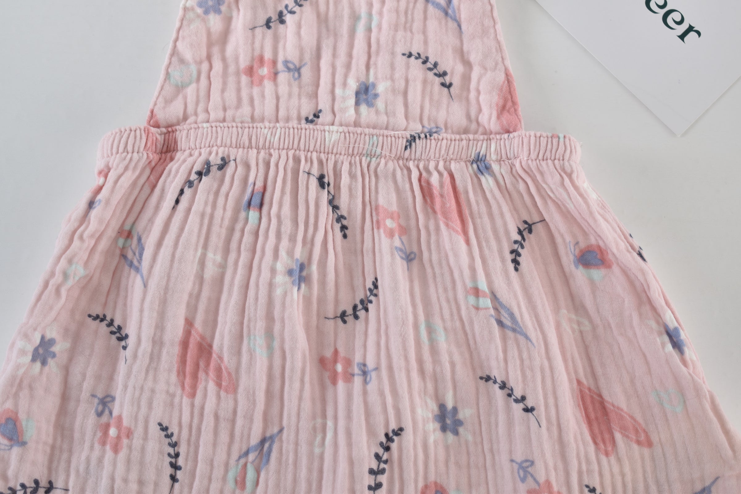Pink muslin pinafore dress