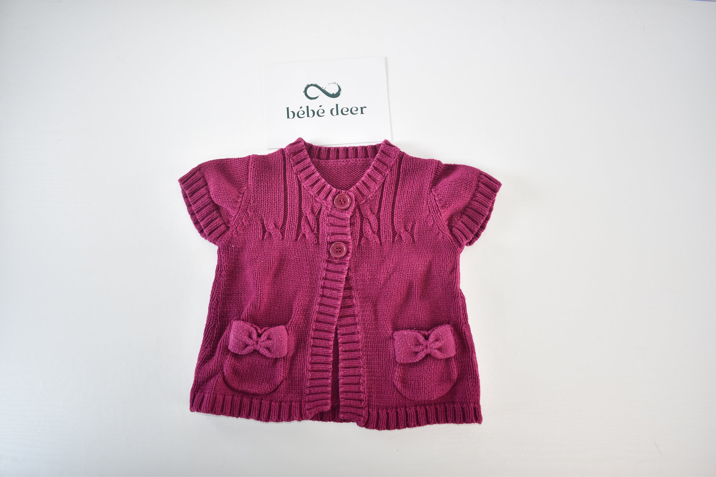 Knitted bow pocket cardigan