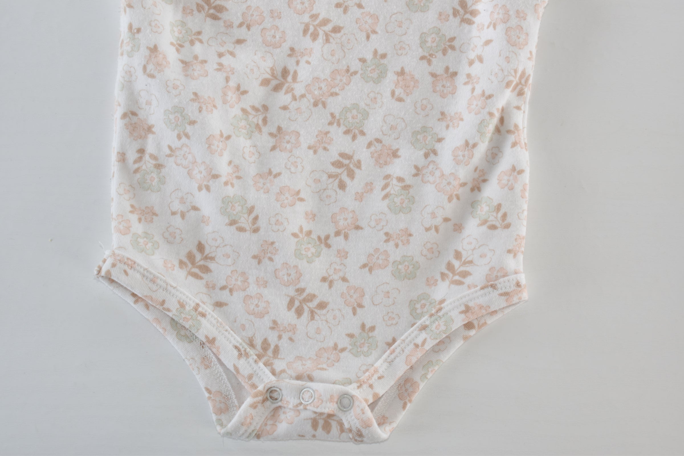 Floral frill sleeve bodysuit