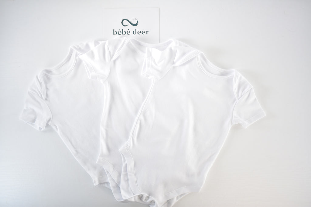 Set of 3 white bodysuits
