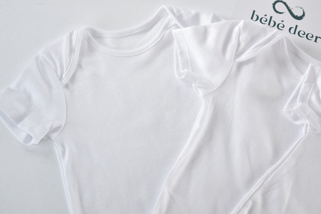 Set of 3 white bodysuits