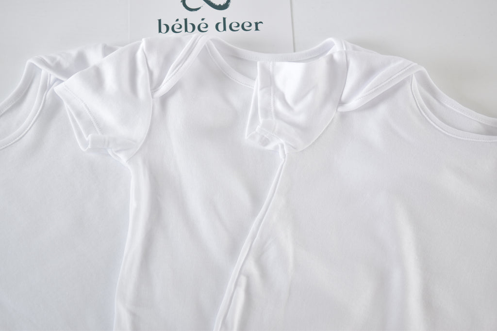Set of 3 white bodysuits