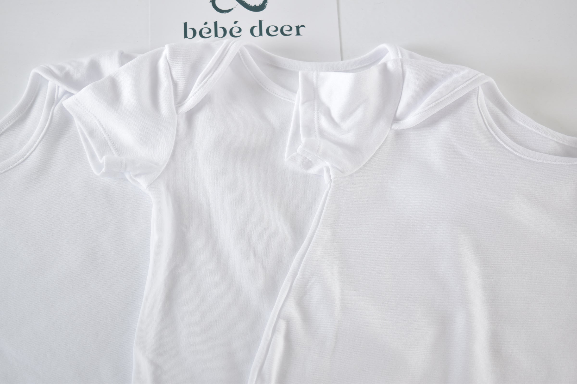 Set of 3 white bodysuits