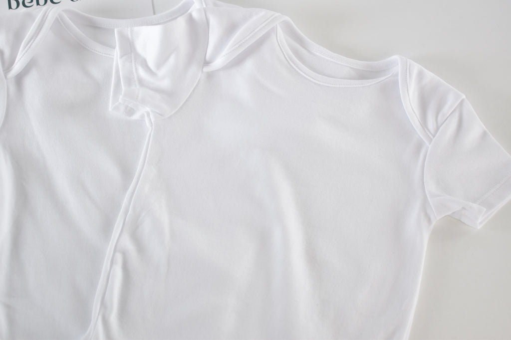 Set of 3 white bodysuits