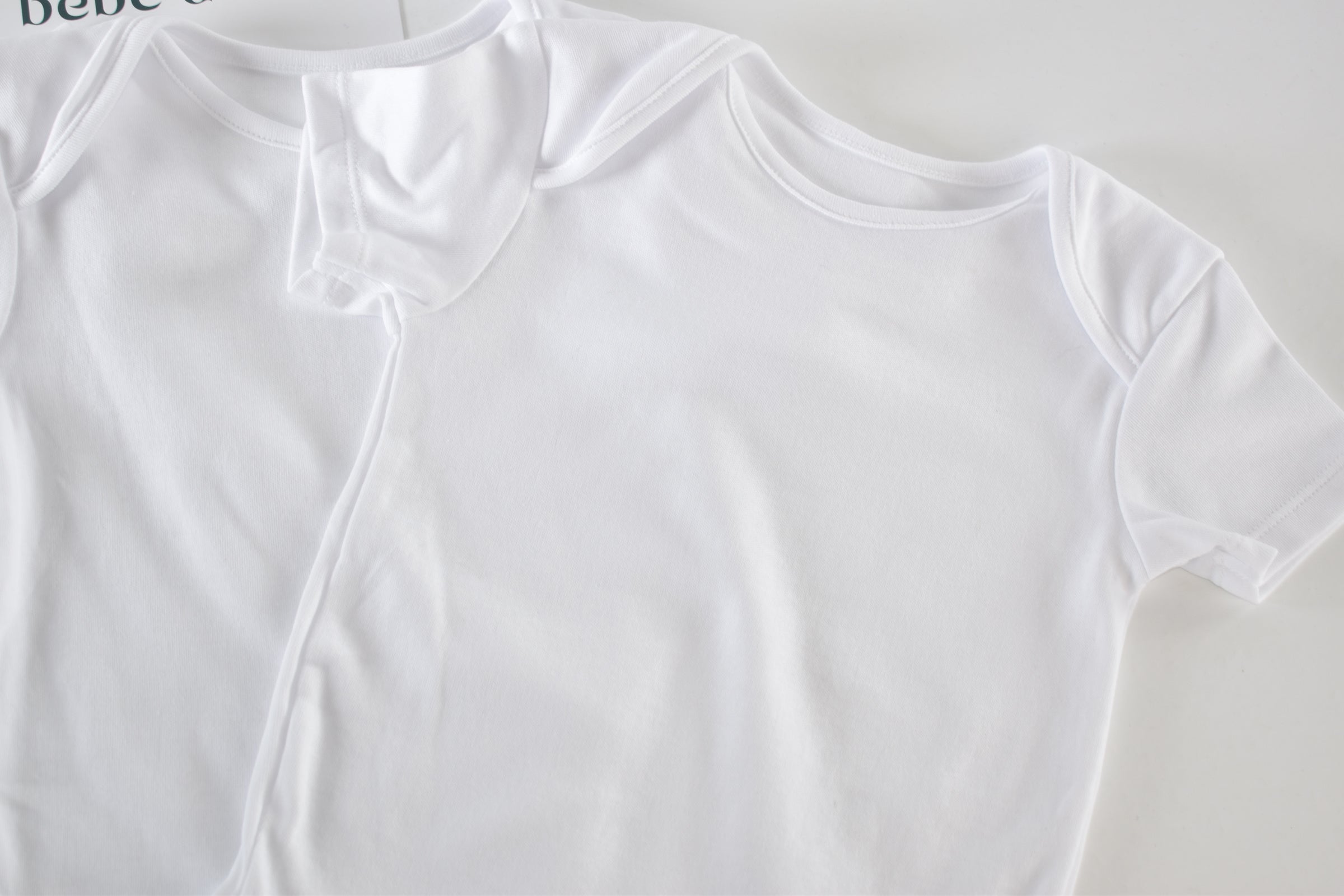 Set of 3 white bodysuits