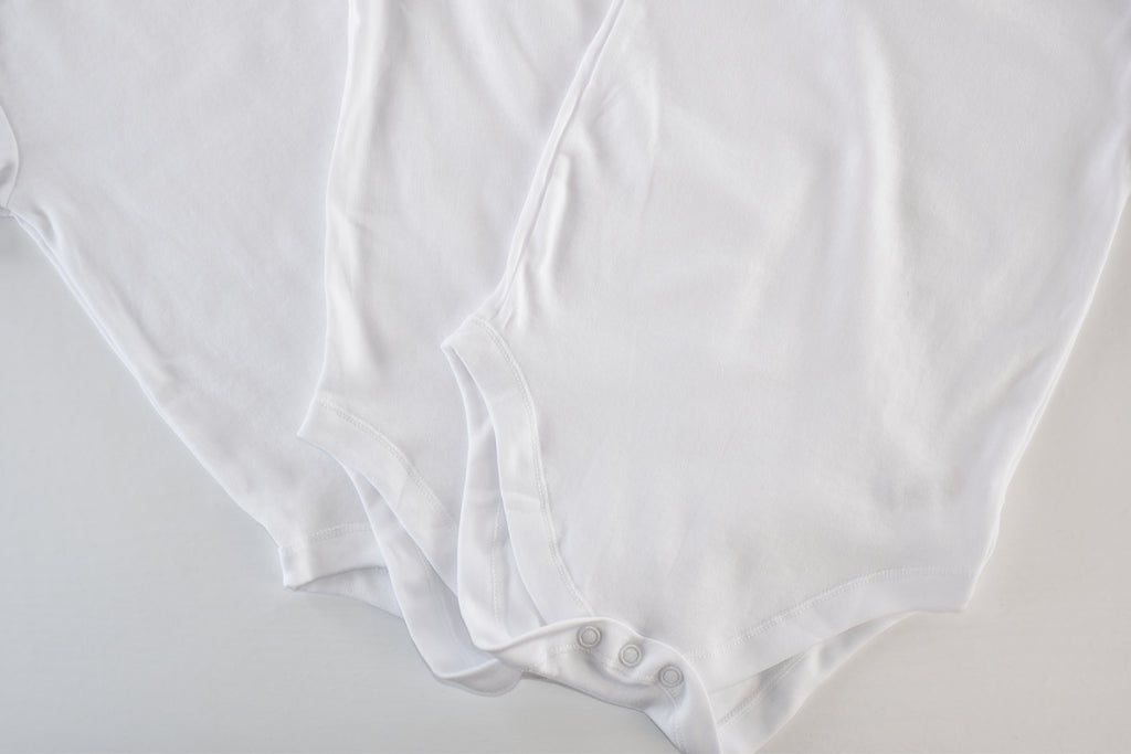 Set of 3 white bodysuits