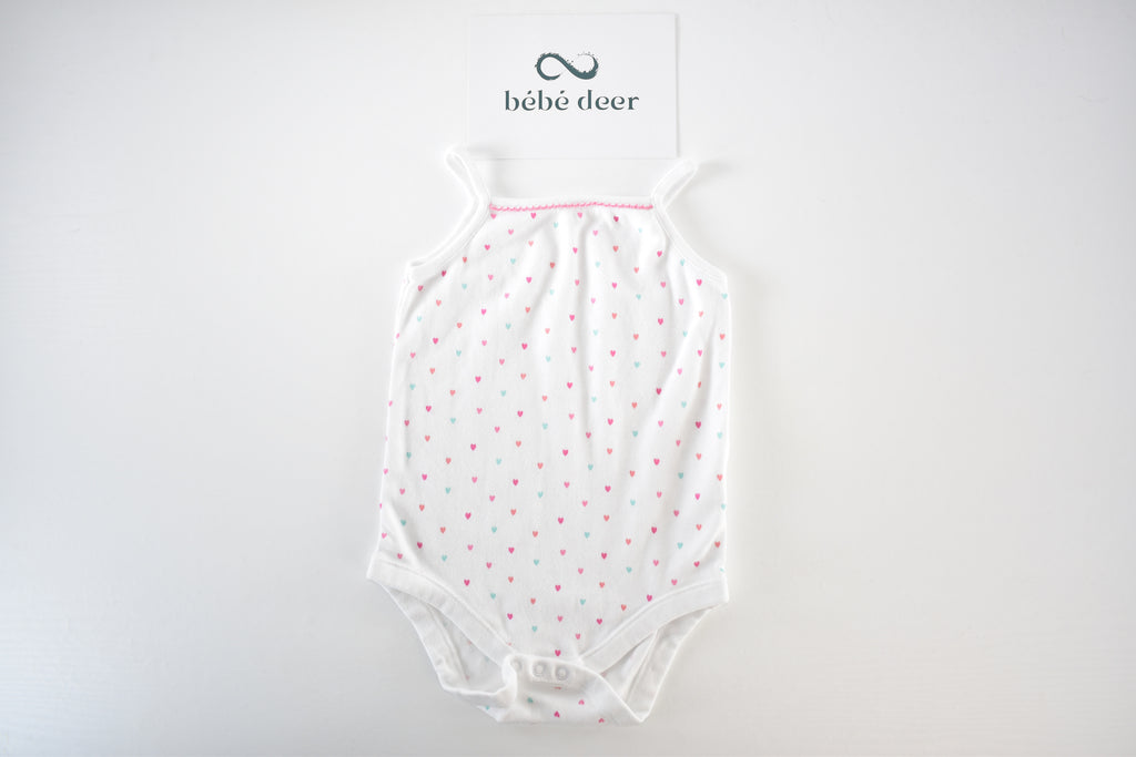 White heart print sleeveless bodysuit