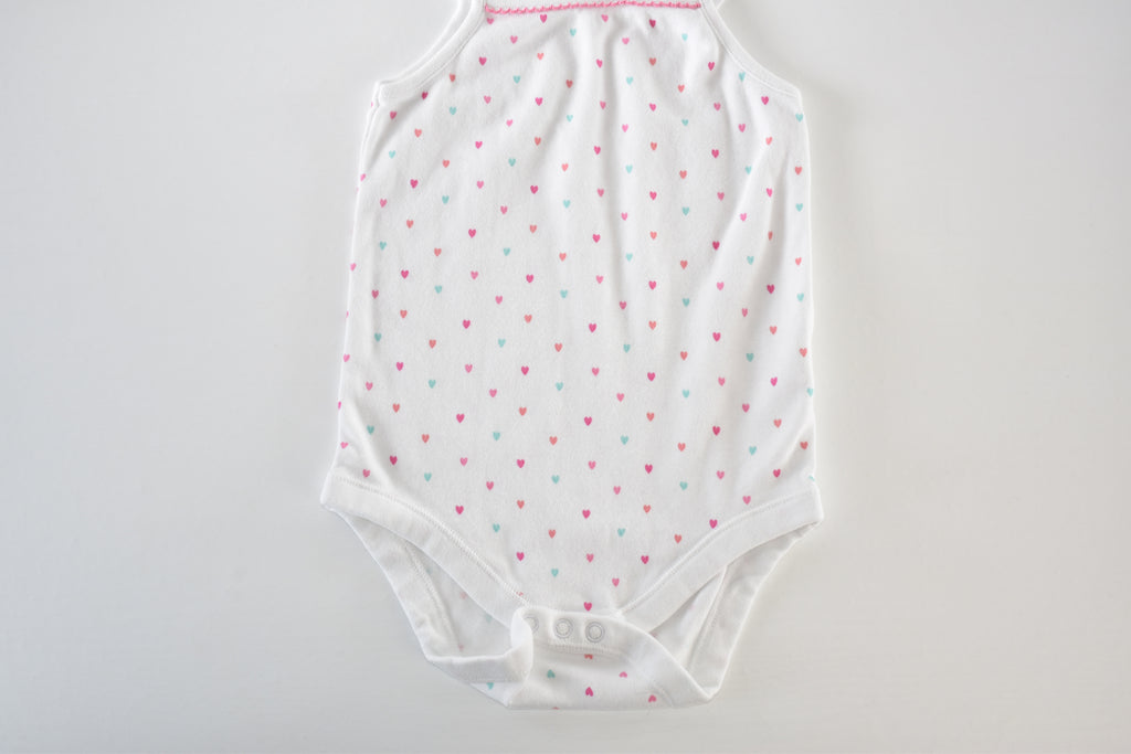 White heart print sleeveless bodysuit