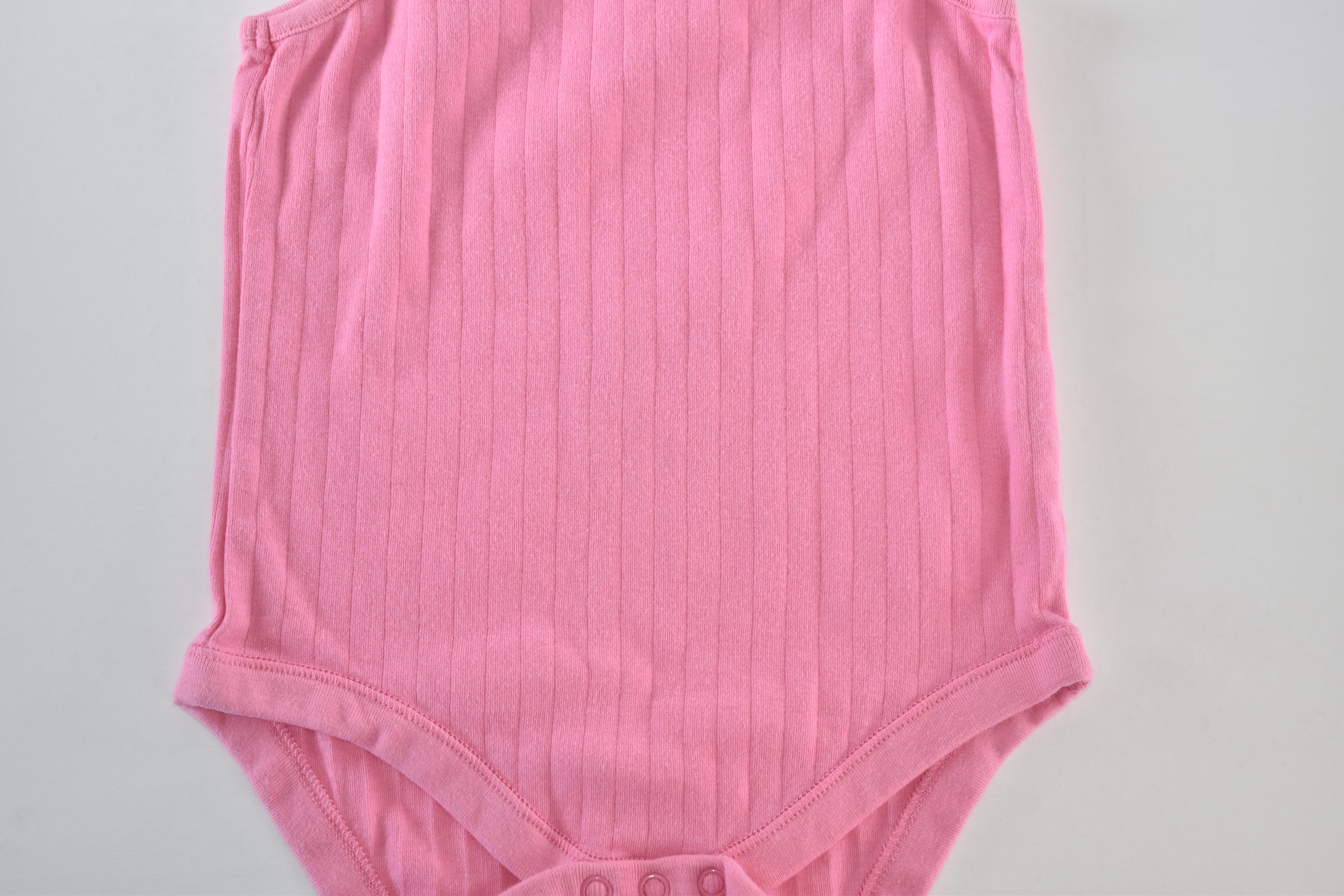 Pink ribbed sleeveless bodysuit
