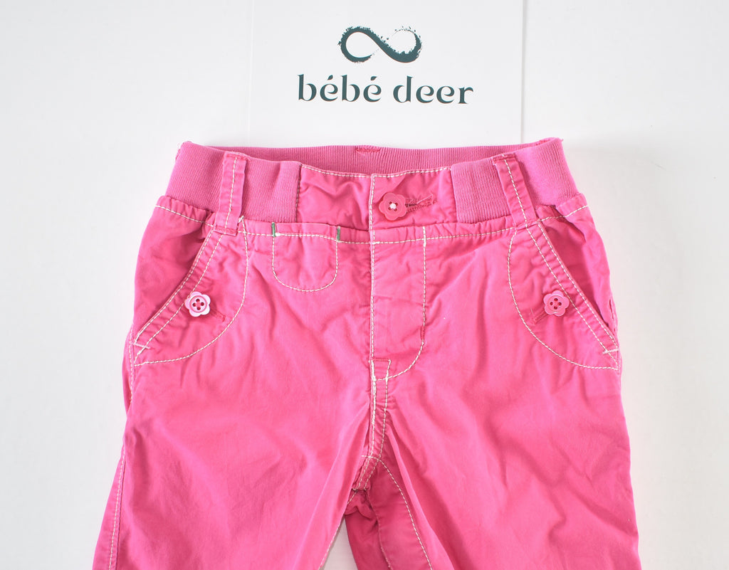 Convertible pink trousers with adjustable legs