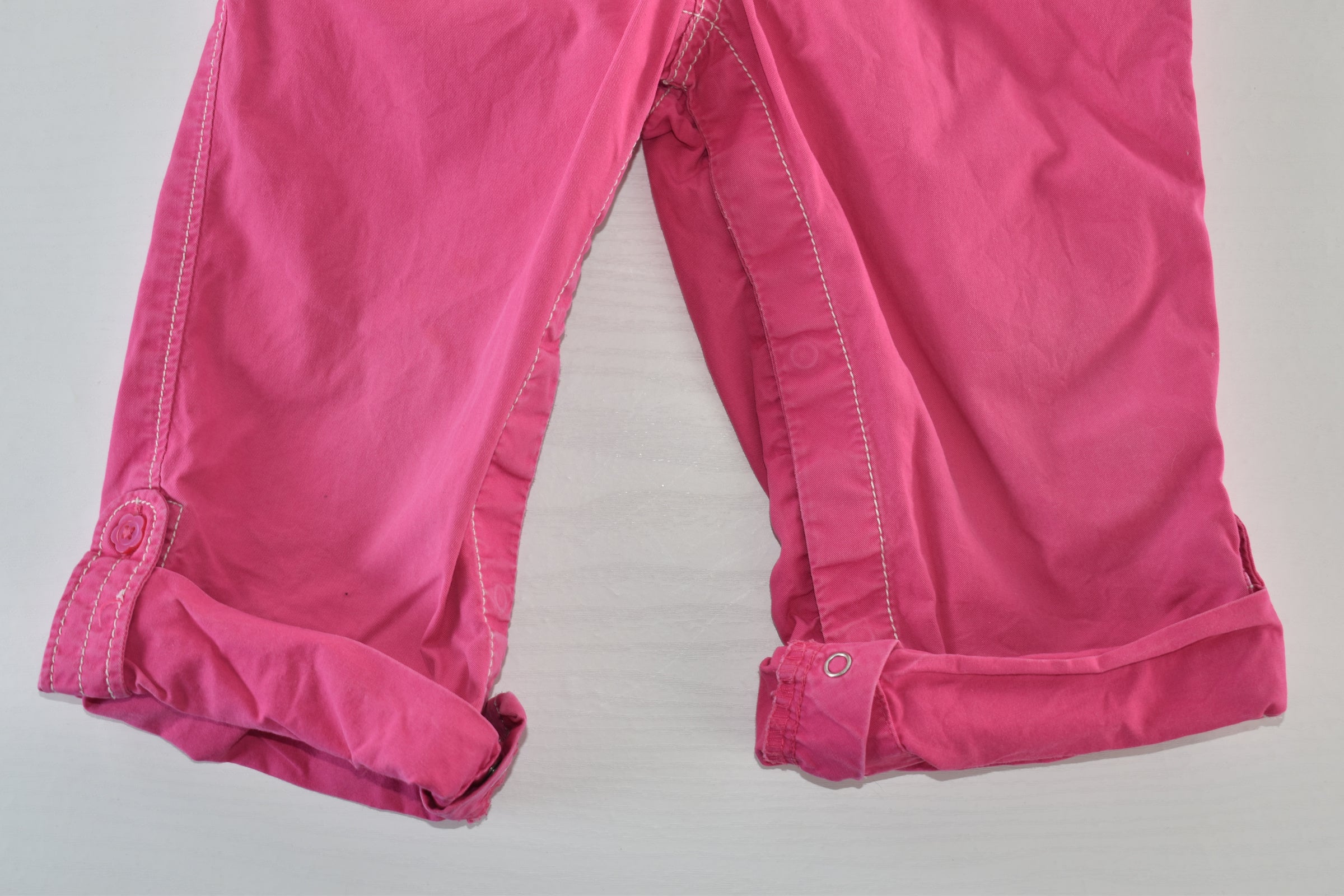 Convertible pink trousers with adjustable legs