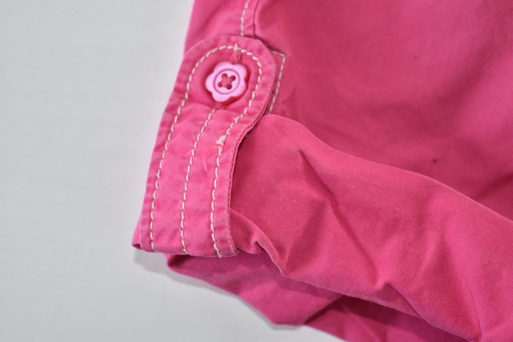 Convertible pink trousers with adjustable legs