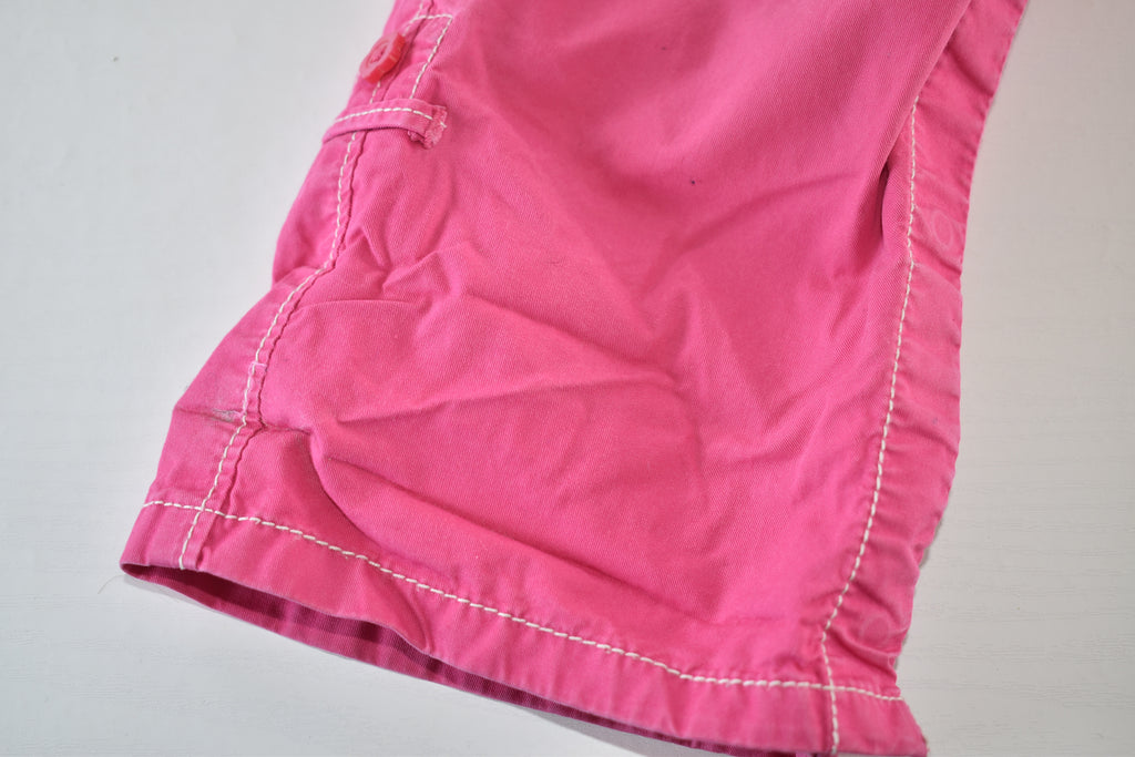 Convertible pink trousers with adjustable legs