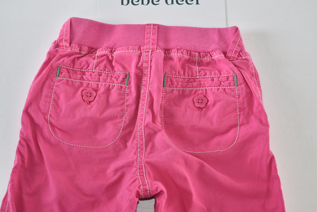 Convertible pink trousers with adjustable legs