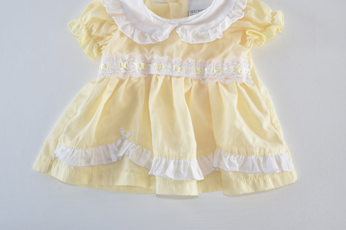 Yellow frill dress