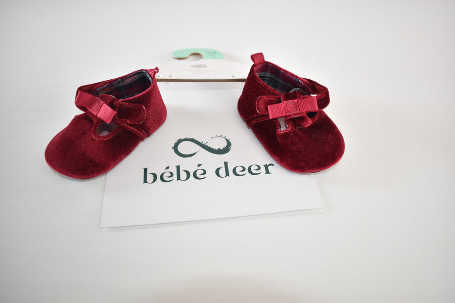 Red velvet shoes with bow detail