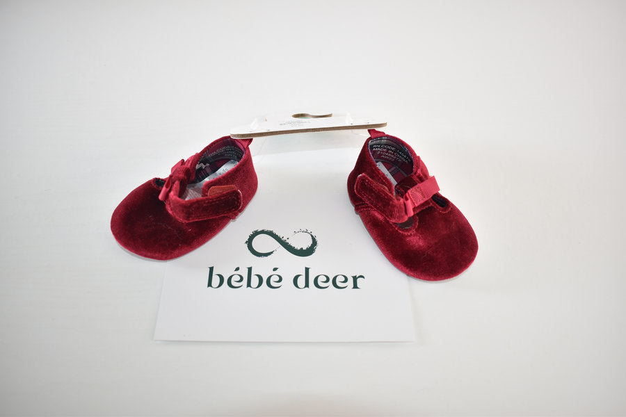 Red velvet shoes with bow detail