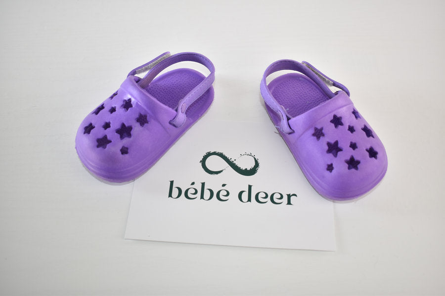 Purple star crocs style shoes