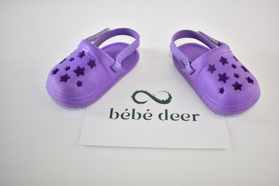 Purple star crocs style shoes