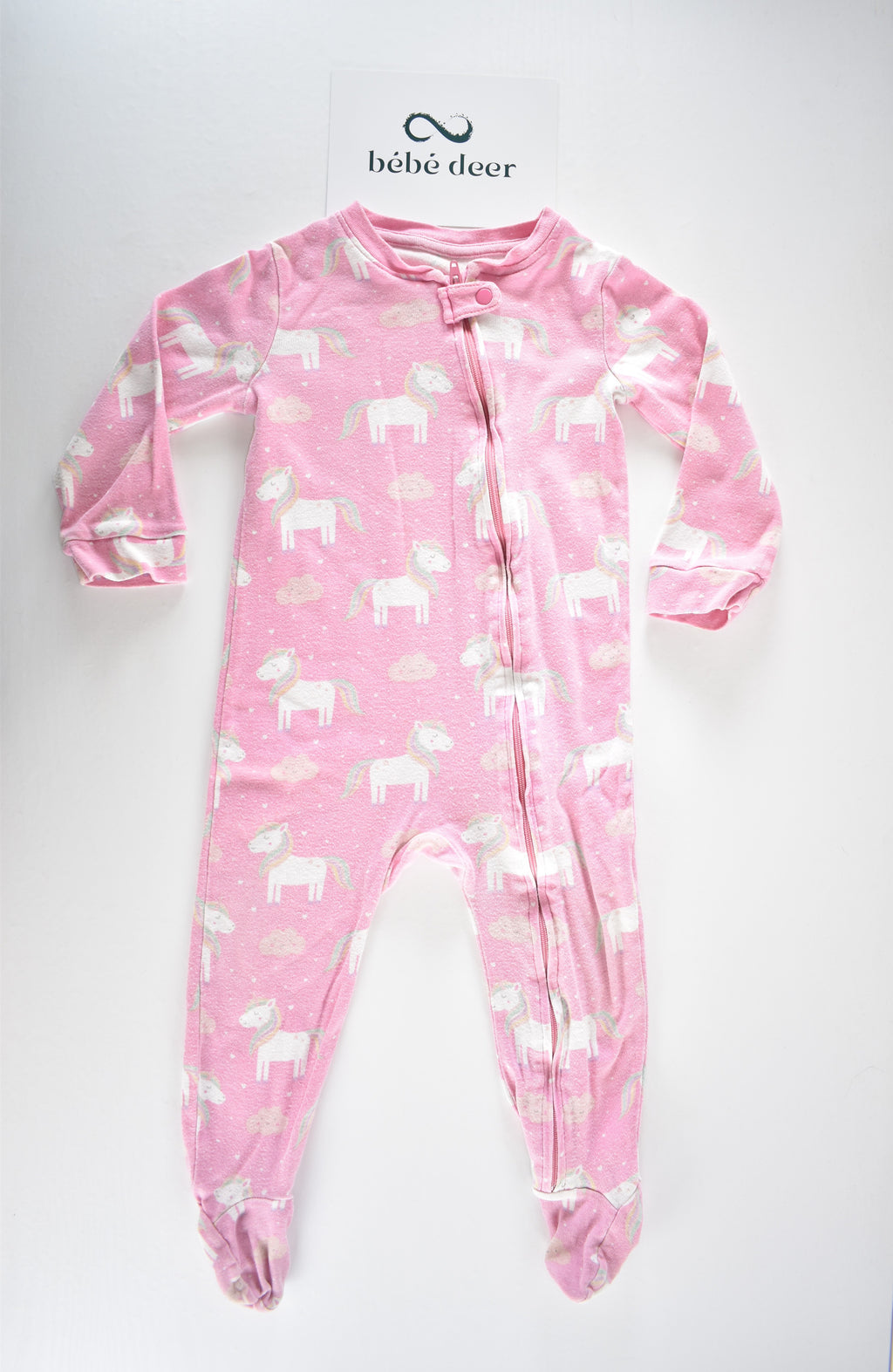 Pink unicorn zip sleepsuit