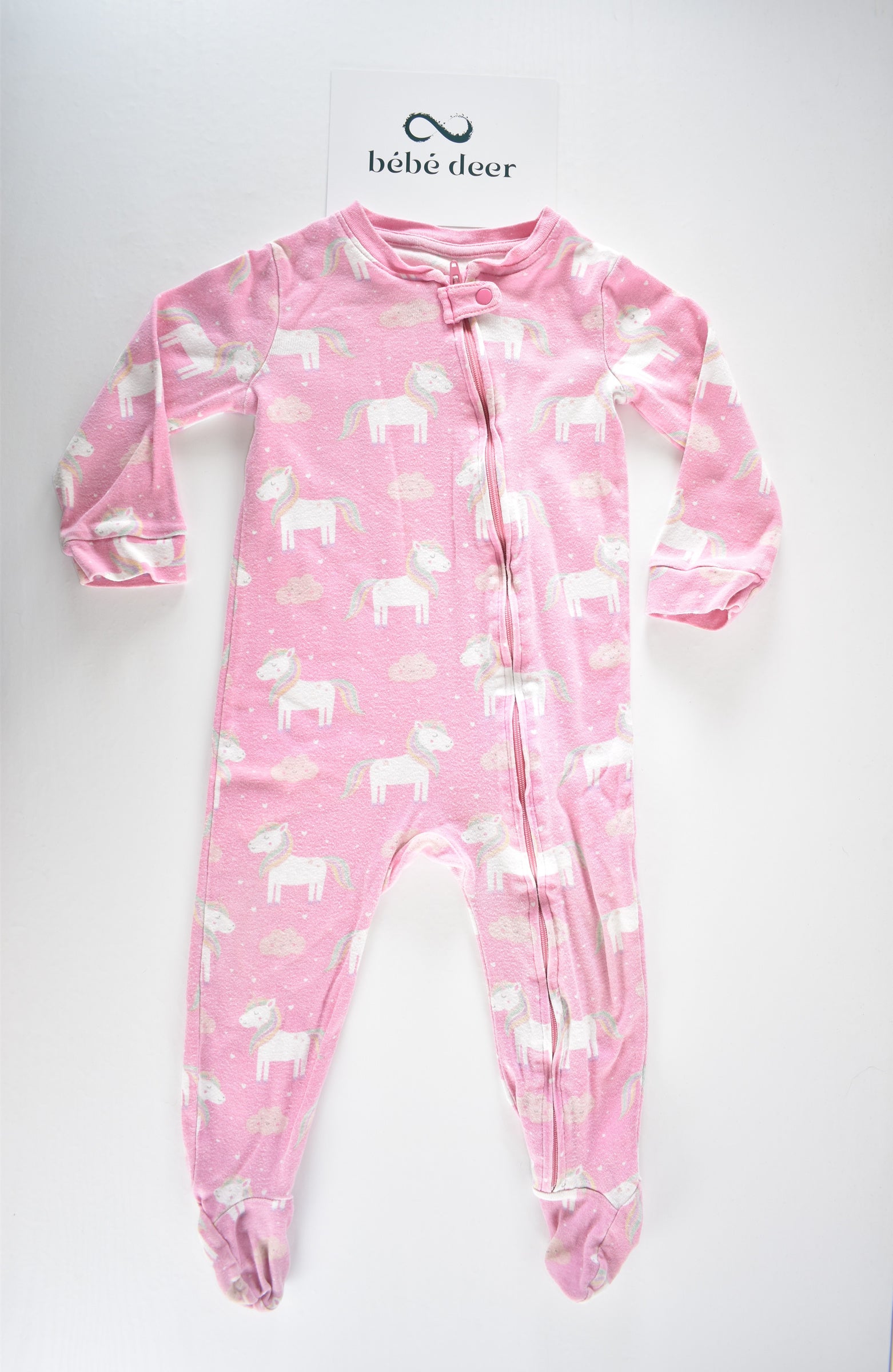 Pink unicorn zip sleepsuit
