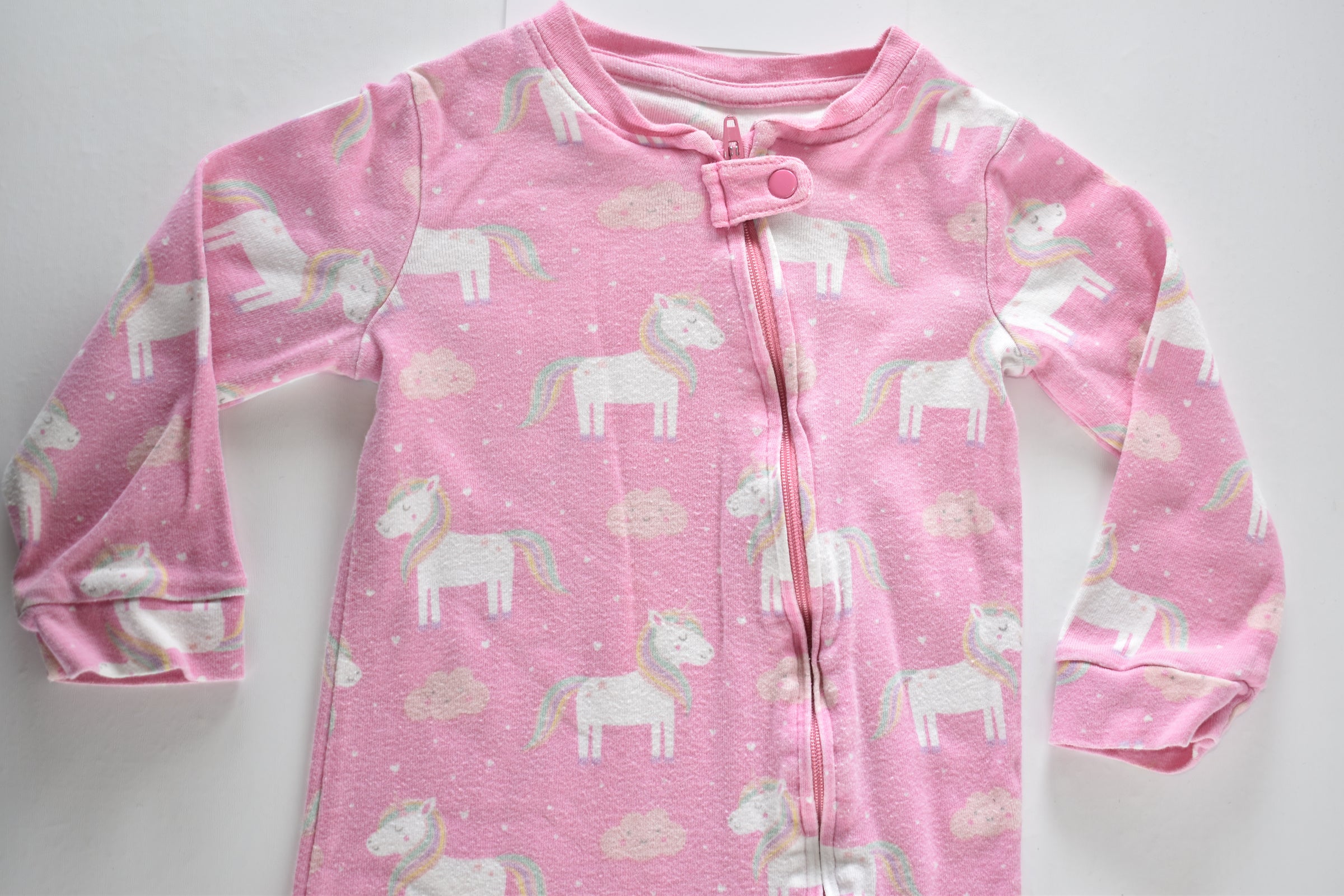 Pink unicorn zip sleepsuit