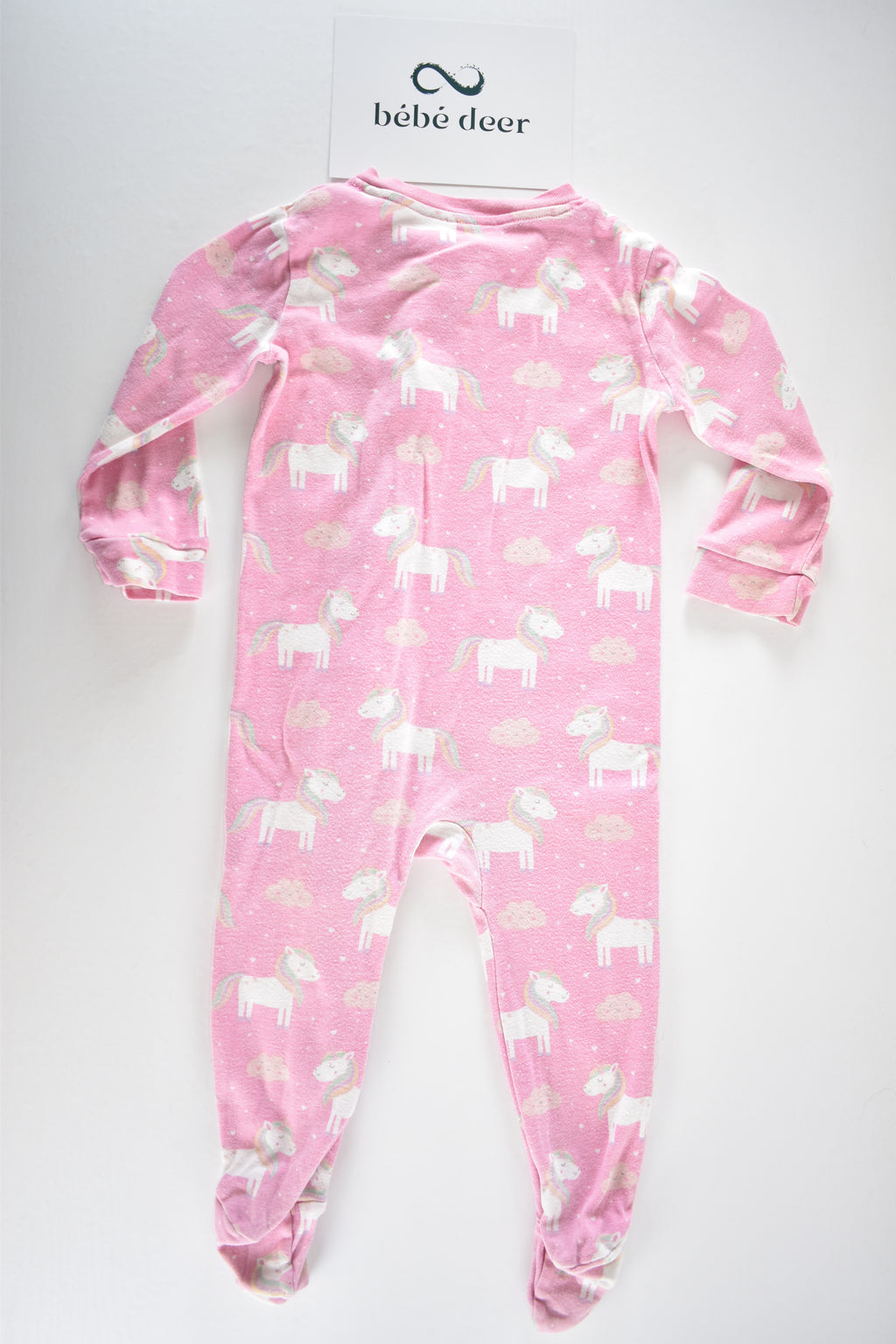 Pink unicorn zip sleepsuit