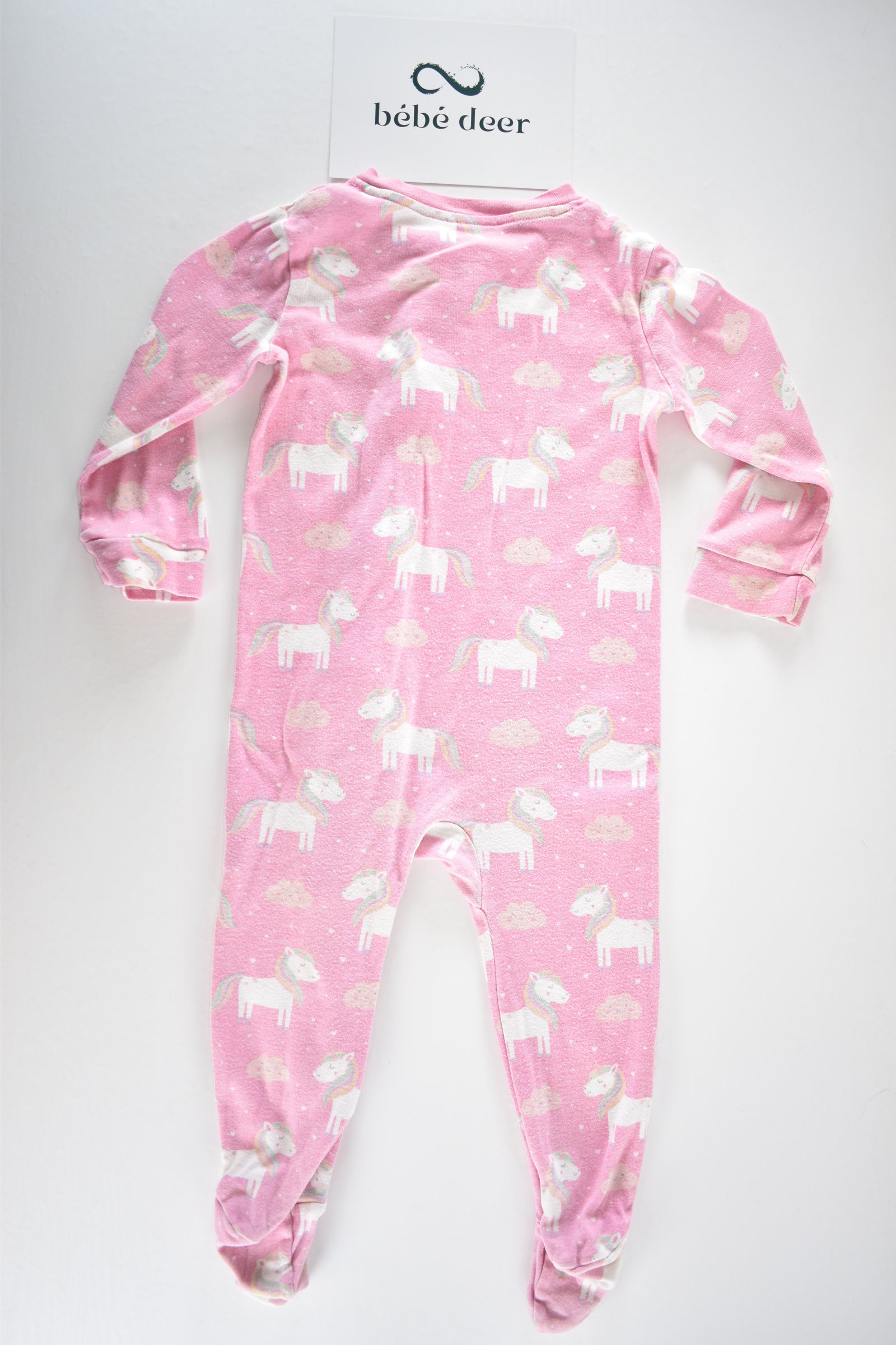 Pink unicorn zip sleepsuit