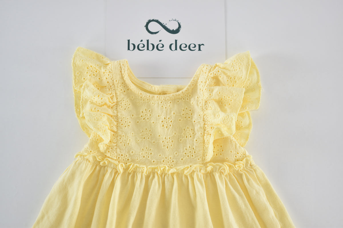 Yellow broderie dress