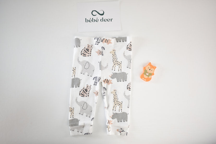 Trousers with safari animal print