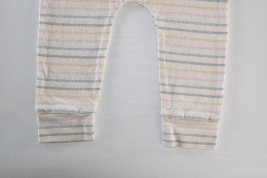 Cream trousers with pastel stripe pattern