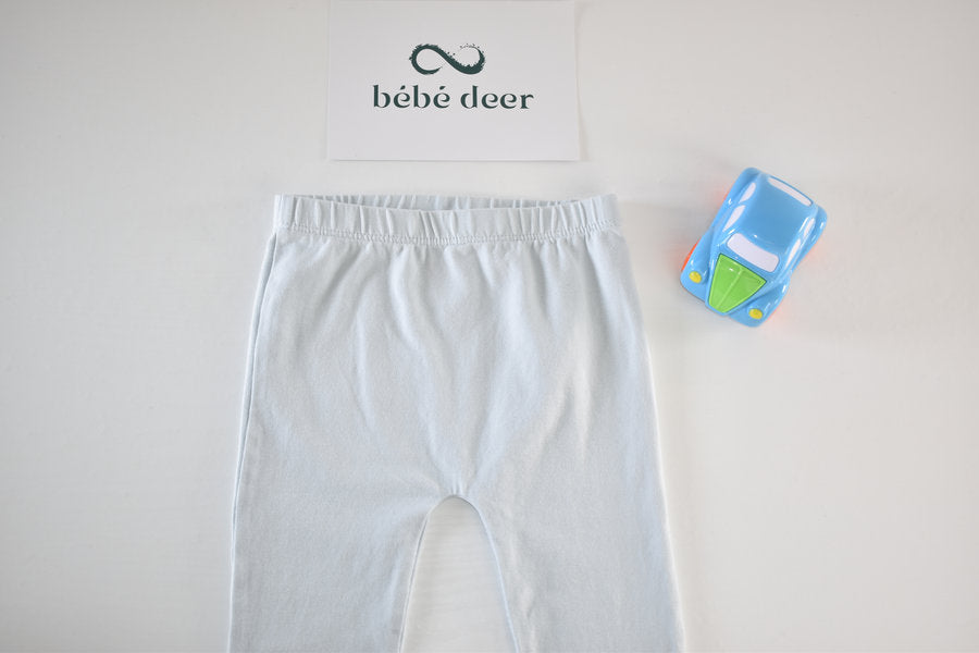 Very light blue (almost white) leggings