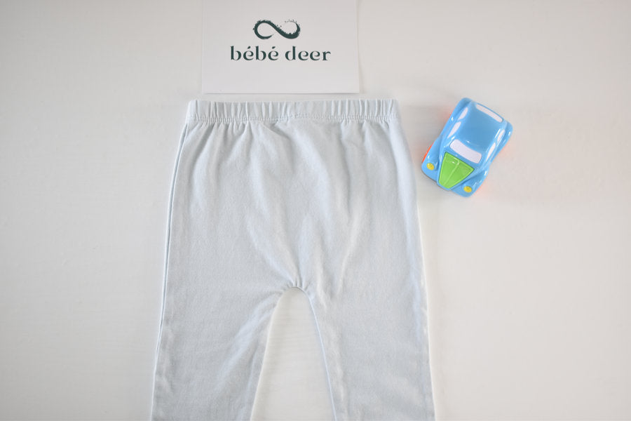 Very light blue (almost white) leggings