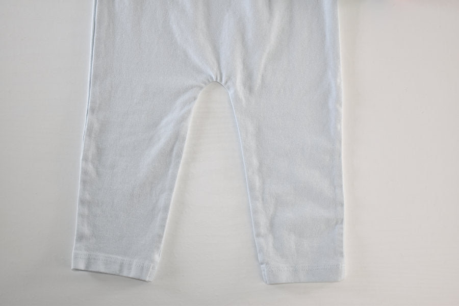 Very light blue (almost white) leggings