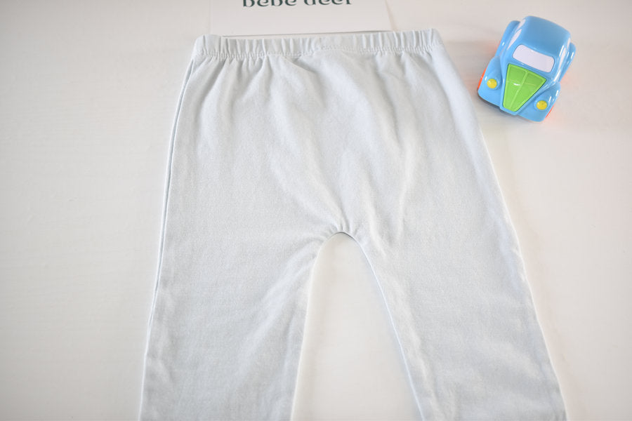 Very light blue (almost white) leggings