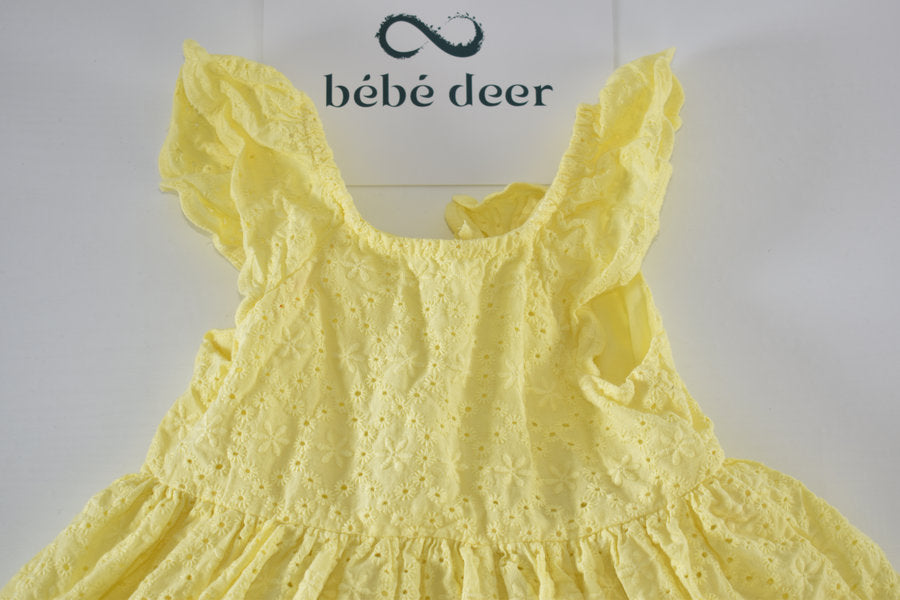 Yellow broderie anglaise dress