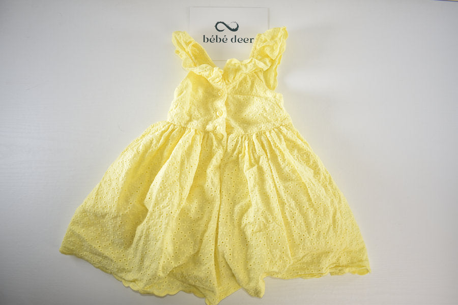 Yellow broderie anglaise dress
