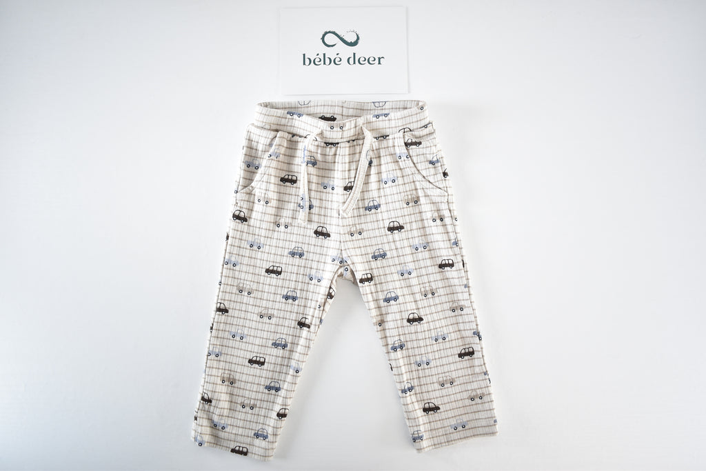 Cream car print trousers