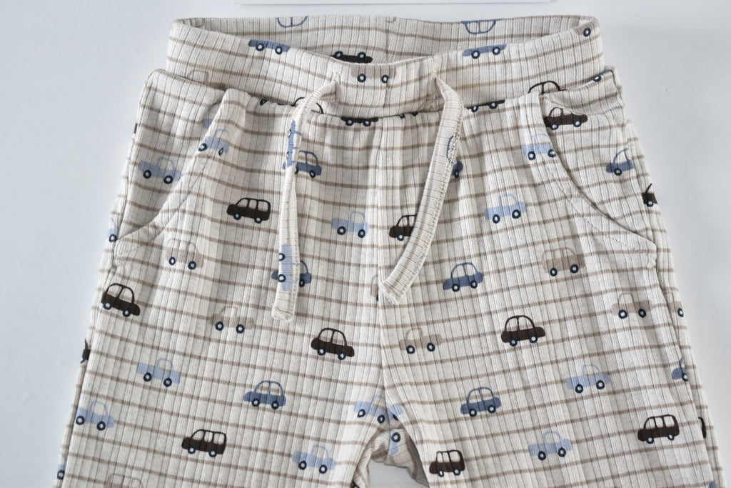 Cream car print trousers