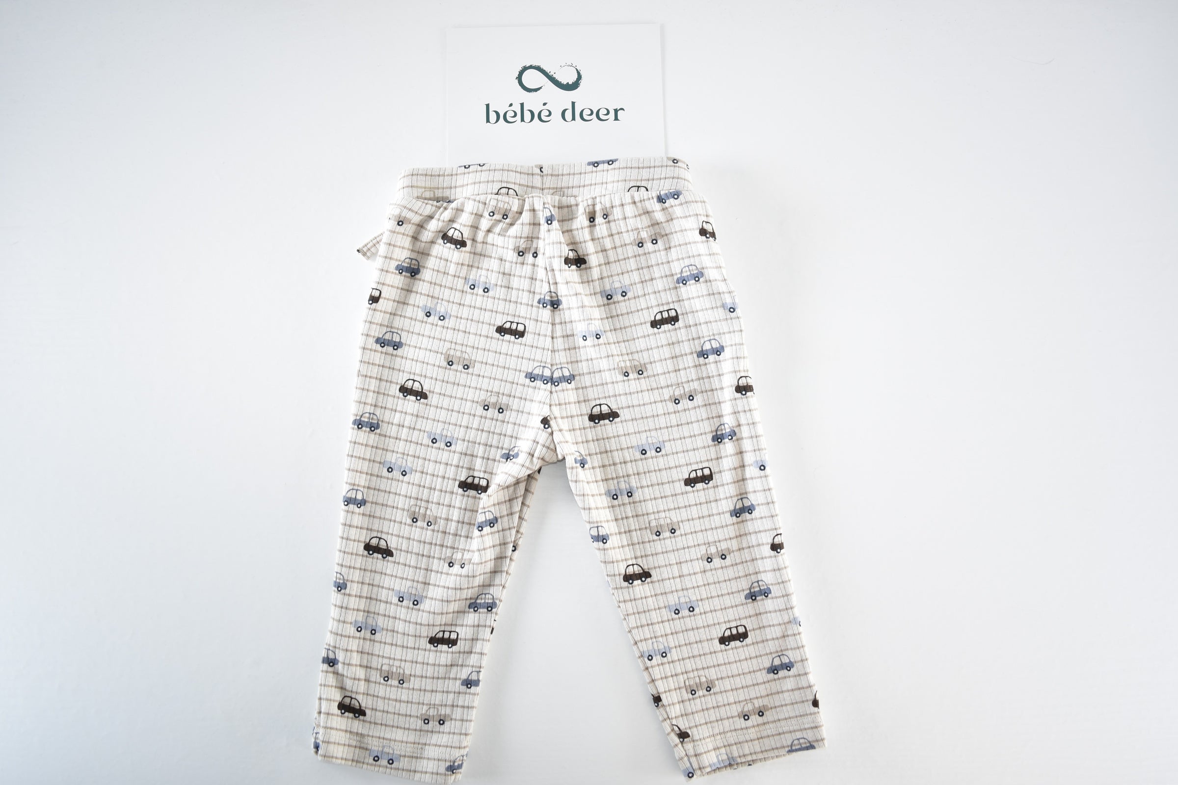 Cream car print trousers