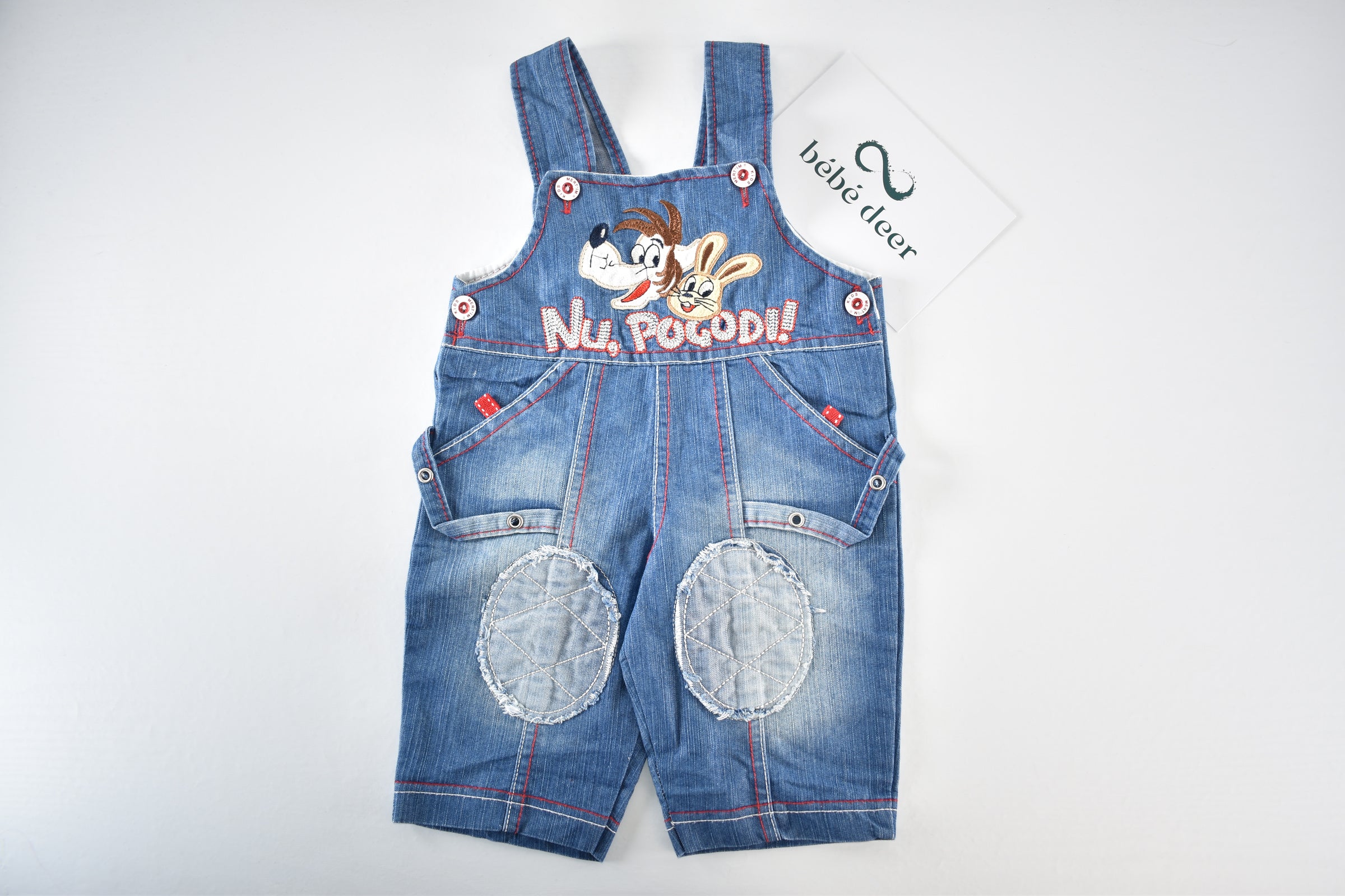 Denim dungarees with embroidered characters