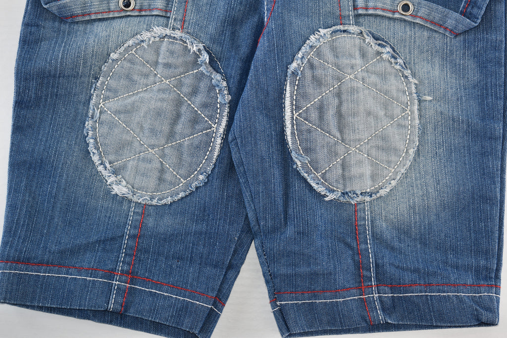 Denim dungarees with embroidered characters